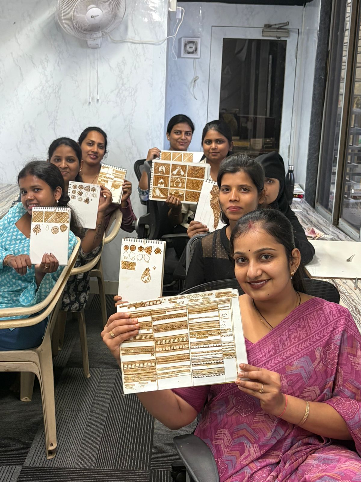 Instructor guiding a student's hand